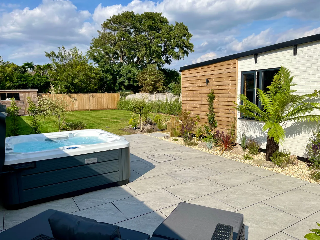 Private enclosed garden with hot tub at dog-friendly holiday home in Berrow near Brean